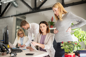 Image showing business team with papers in office