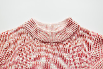 Image showing close up of sweater or pullover on white