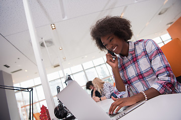 Image showing African American informal business woman working in the office