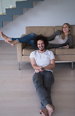 Image showing young couple relaxes in the living room