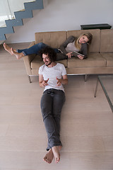 Image showing young couple relaxes in the living room