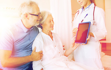 Image showing senior woman and doctor with tablet pc at hospital