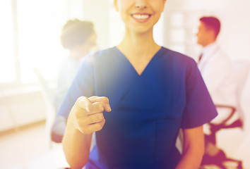 Image showing close up of nurse pointing on you at hospital