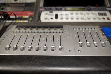 Image showing music mixing console at sound recording studio