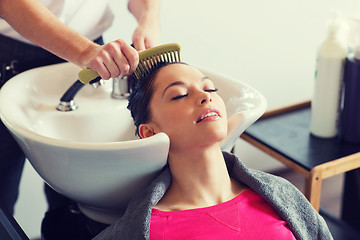 Image showing happy young woman at hair salon