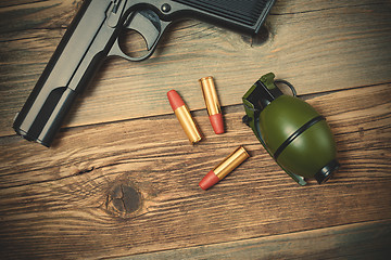 Image showing hand gun, grenade and cartridges