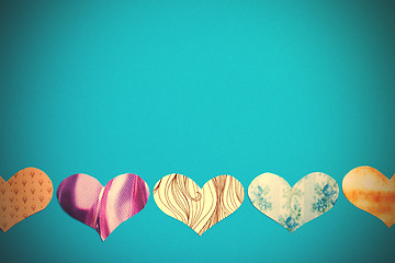 Image showing multicolored hearts on a blue background