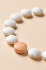 Image showing white and orange pills