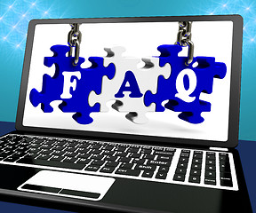 Image showing FAQ Puzzle On Laptop Shows Website Assistance