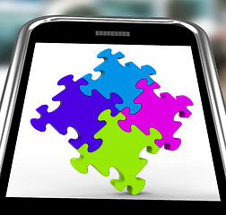 Image showing Puzzle Square On Smartphone Shows Unity