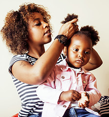 Image showing adorable sweet young afro-american mother with cute little daugh