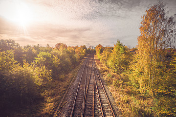 Image showing Railroad in autumn going to the city