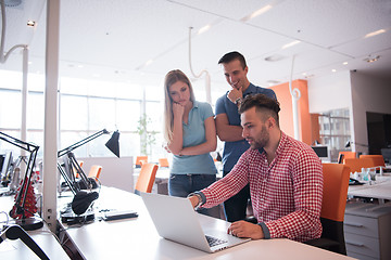 Image showing Group of young people employee workers with computer