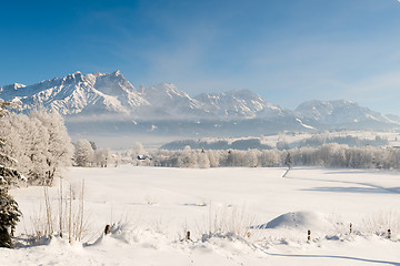 Image showing Austrian Winter Wonderland with mountains, fresh snow and haze