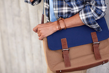 Image showing close up of hipster man with stylish shoulder bag