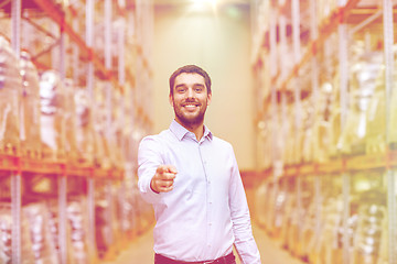 Image showing happy man at warehouse