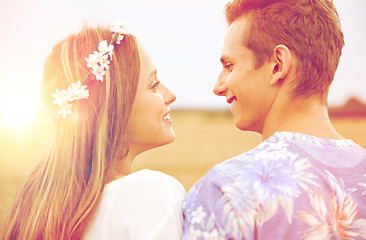 Image showing happy smiling young hippie couple outdoors