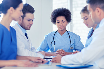 Image showing group of happy doctors meeting at hospital office