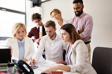 Image showing business team discussing house project at office