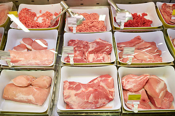 Image showing meat in bowls at grocery stall