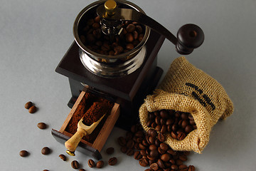 Image showing Grinding coffee