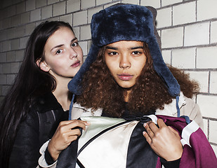 Image showing Two teenage girls infront of university building smiling, having fun traveling europe, lifestyle people concept 