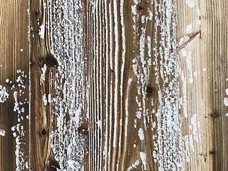 Image showing old wood covered with snow background