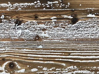 Image showing old wood covered with snow background