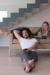 Image showing young couple relaxes in the living room