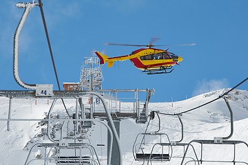 Image showing Rescue helicopter in the mountains