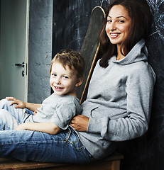 Image showing young hipster teenage girl sitting with her brother in classroom