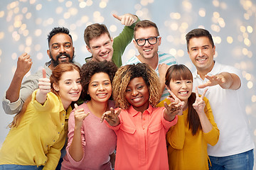 Image showing international group of people showing thumbs up