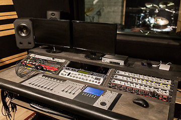 Image showing music mixing console at sound recording studio