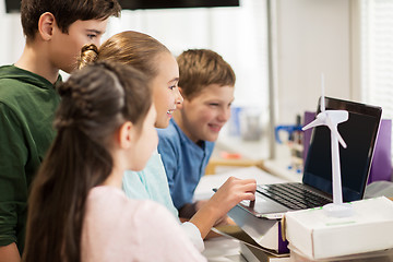 Image showing children with laptop and wind turbine at school