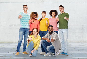 Image showing international group of people showing thumbs up