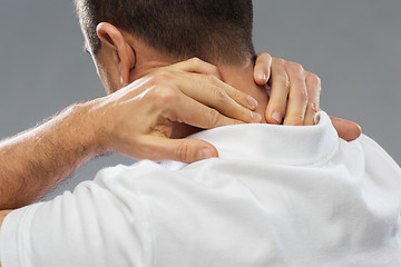 Image showing close up of man suffering from neck pain