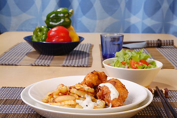 Image showing French fries and chicken