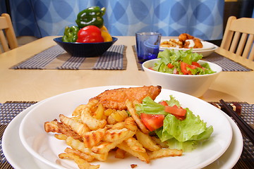 Image showing French fries and chicken