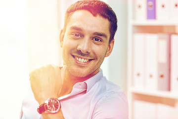 Image showing portrait of smiling businessman in office