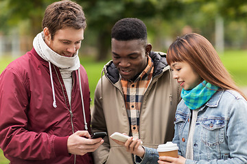 Image showing happy friends with smartphone and coffee outdoors