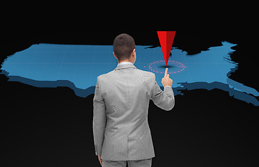 Image showing businessman with virtual usa map and pointer