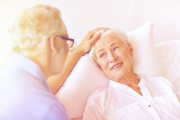 Image showing senior couple meeting at hospital ward