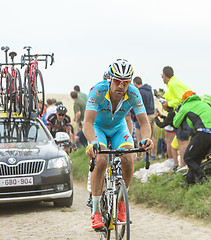 Image showing Lieuwe Westra Riding on a Cobblestone Road - Tour de France 2015