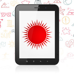 Image showing Vacation concept: Tablet Computer with Sun on display