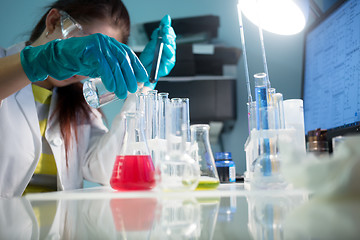 Image showing Woman with laboratory test tubes