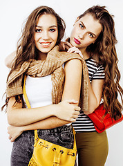 Image showing best friends teenage girls together having fun, posing emotional on white background, besties happy smiling, lifestyle people concept 