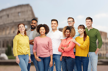 Image showing international group of happy people over coliseum