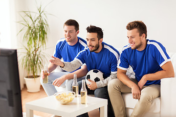 Image showing friends or football fans watching soccer at home