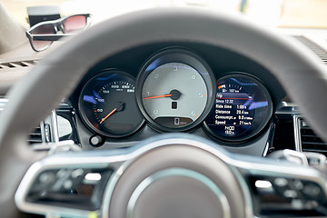 Image showing close up of car dashboard and steering wheel