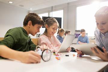 Image showing kids with tablet pc programming at robotics school